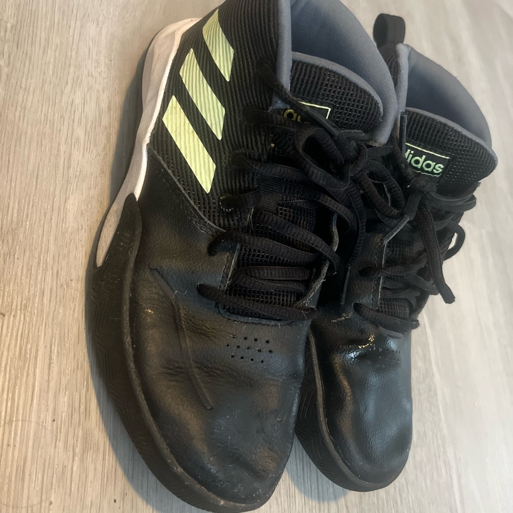 Adidas Black Sneakers with Yellow Stripes